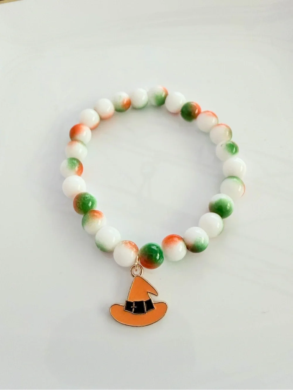 Handmade White, Orange & Green Beaded Bracelet with Witch Hat Charm